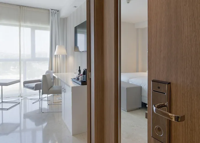 Отель Nh Ciudad De